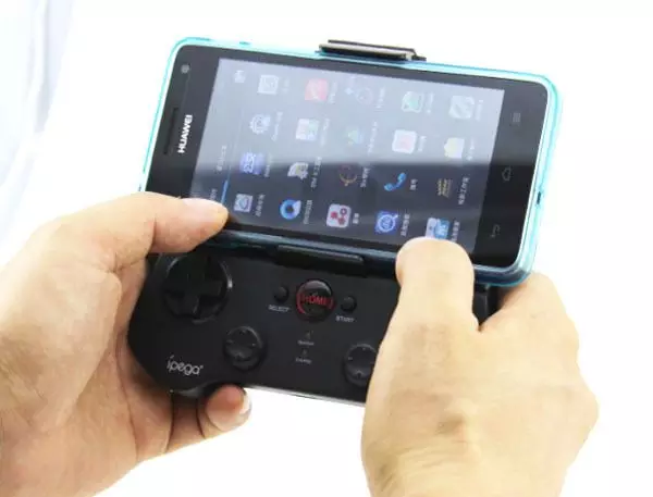 手柄能玩手机游戏吗_手机玩fc游戏连接手柄_手机玩fc游戏能插手柄吗